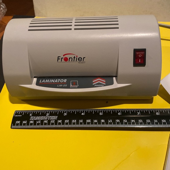 Laminating Machine, Instruction Booklet, and Package of Laminating Sleevrs - Picture 6 of 7